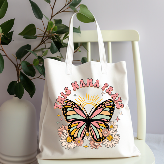 This Mama Prays Tote Bag